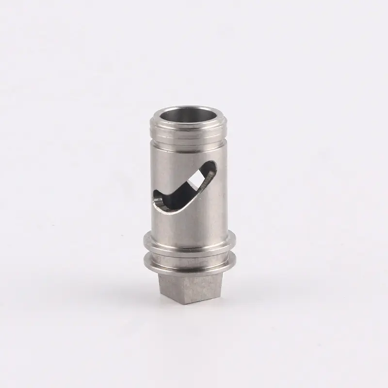 Precision CNC machined stainless steel component with a slotted design for fluid flow control and industrial applications