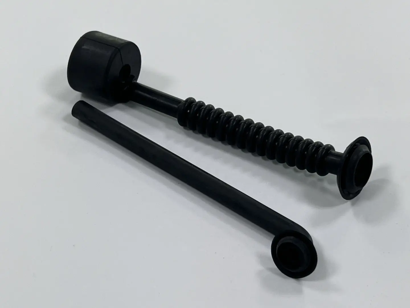 Custom molded black rubber corrugated flexible cable boot and protective sleeve for automotive or machinery