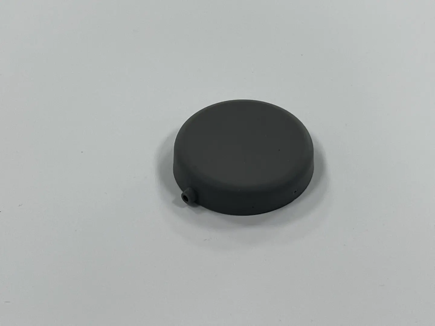 Black rubber diaphragm cover with air nozzle, custom molded industrial rubber protective part