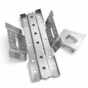 Precision CNC machined stainless steel parts with custom perforations and a fan housing, ideal for electronic enclosures and industrial applications.