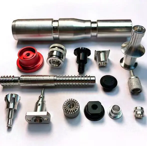 High-precision CNC machined metal components for industrial use, including gears, nozzles, and fittings in various materials like aluminum and steel.